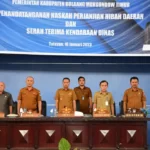 Bupati Boltim Tandatangani NPHD dan Serah Terima Kendis ke Pemdes