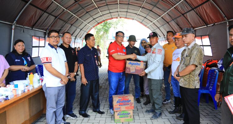 Pemkot Kotamobagu Serahkan Bantuan Terdampak Banjir di Bolmong