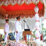 Pj Wali Kota Kotamobagu Irup Upacara Penurunan Bendera HUT Kemerdekaan RI ke-79