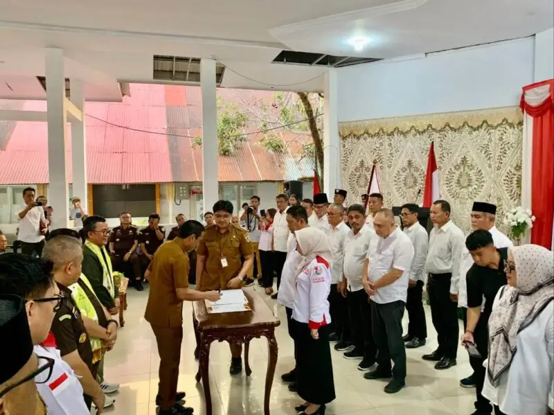 Pemkot Kotamobagu Lantik Srikandi Jaga Desa - Aslinmas